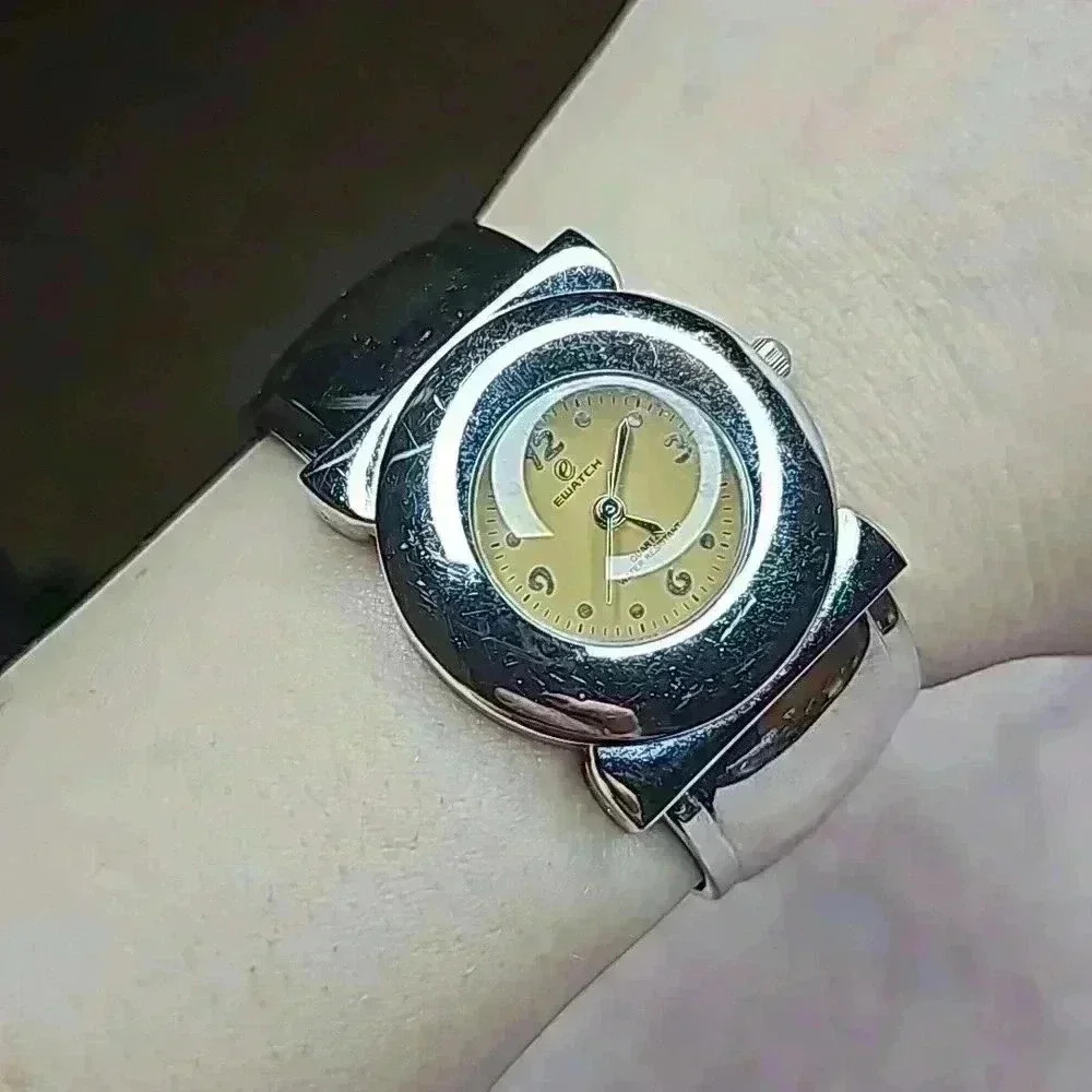 EWATCH Classic Silver Tone Cuff Bracelet Round Face Watch with Tan Face